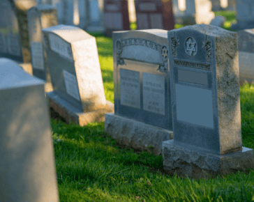 Headstones in cemetery Headstones in cemetery