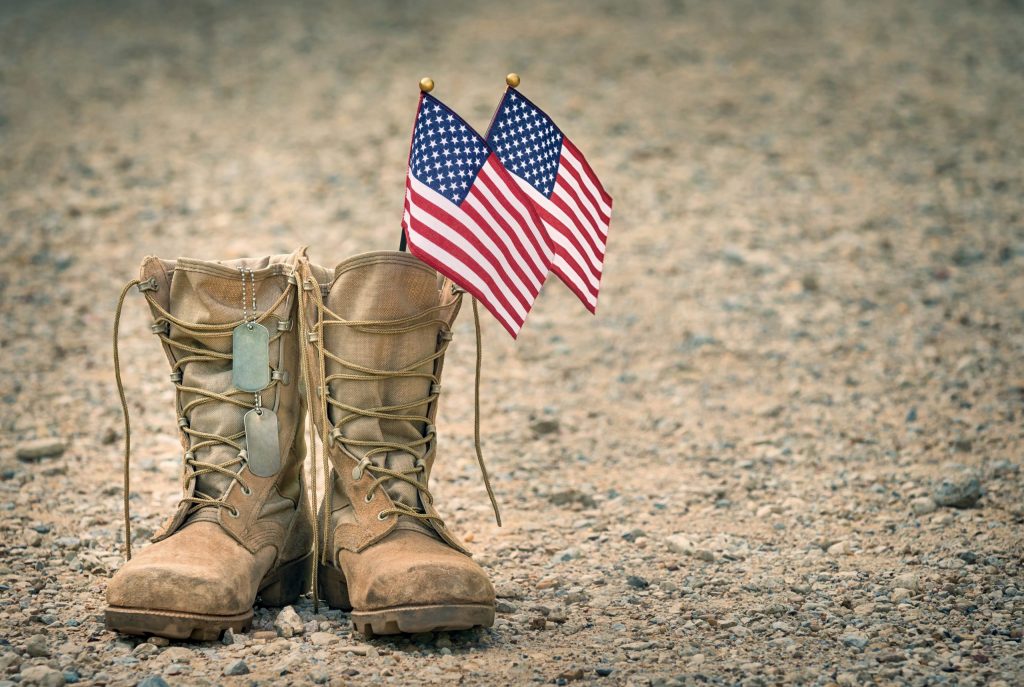 American flags inside military boots American flags inside military boots