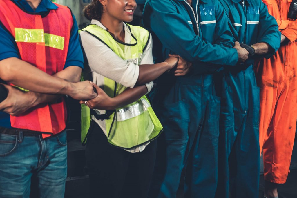 union workers holding hands union workers holding hands